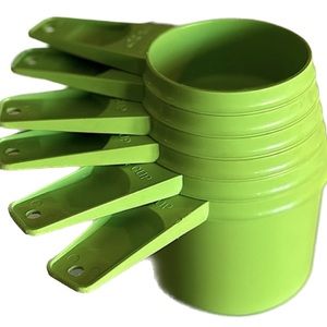 Vintage Tupperware complete set measuring cups green 761-4